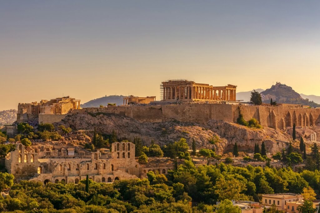 Acropolis of Athens with the Parthenon seen from Filopappou Hill at golden hour