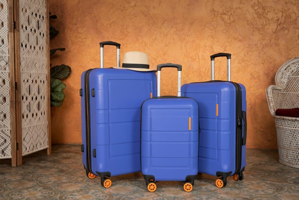 Three pieces of luggage — illustrative photograph, not a TransferHub vehicle capacity example